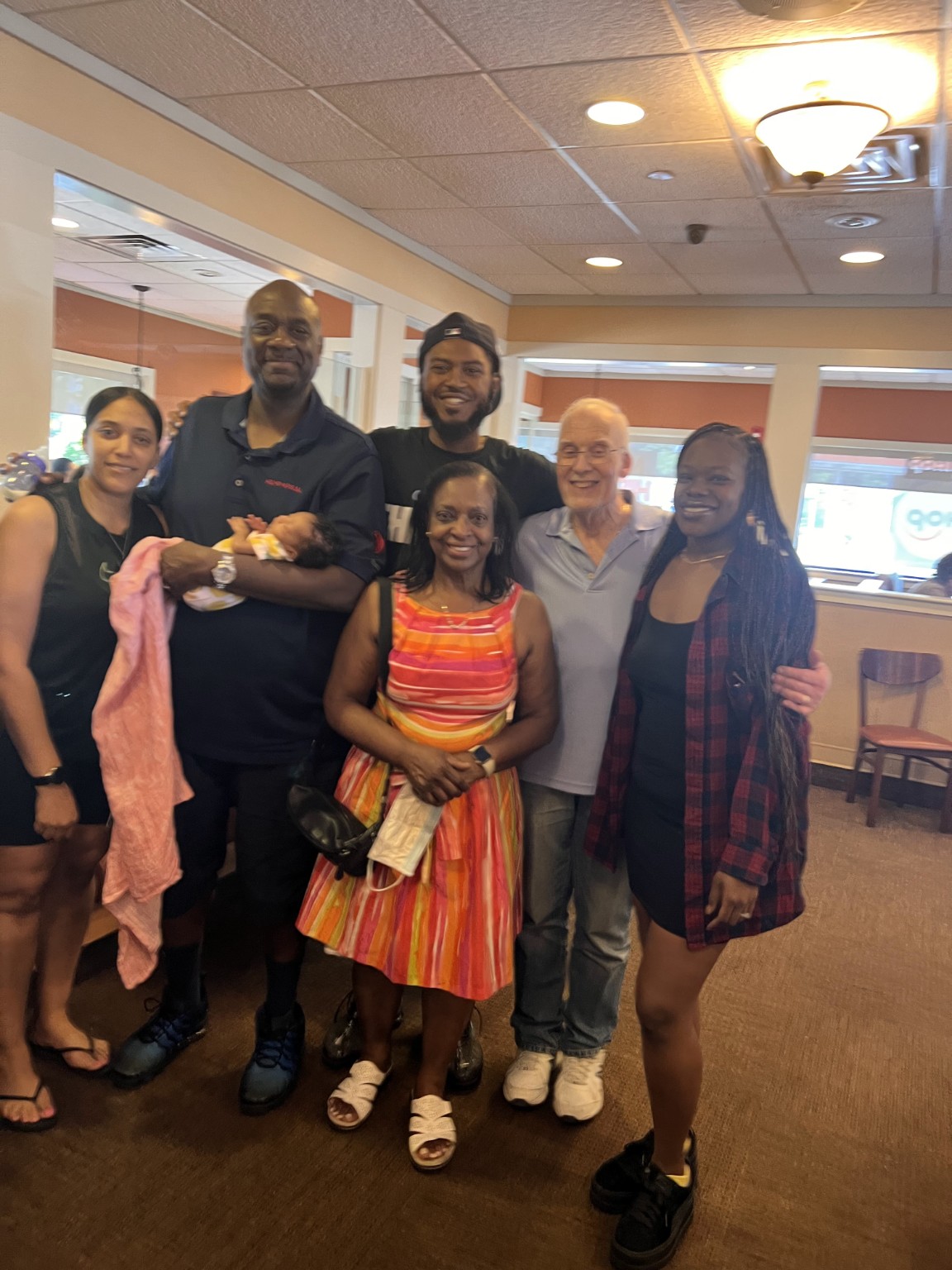 Terrence L Pounds and Michelle Pounds sharing time with Rob and his family.