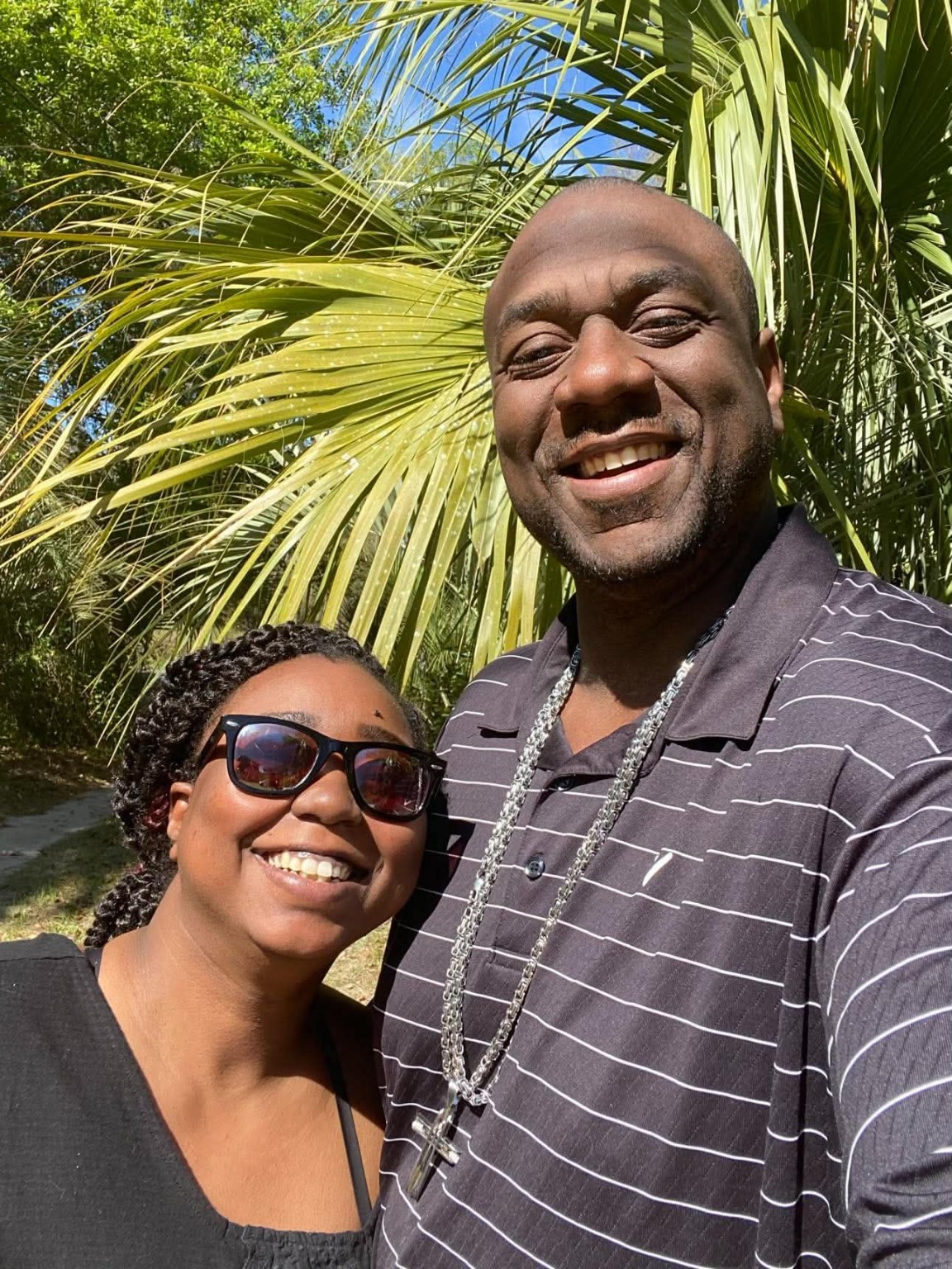 Our firstborn, Daqunette—Dayy for short—enjoying the sun in Florida with Terrence L Pounds.