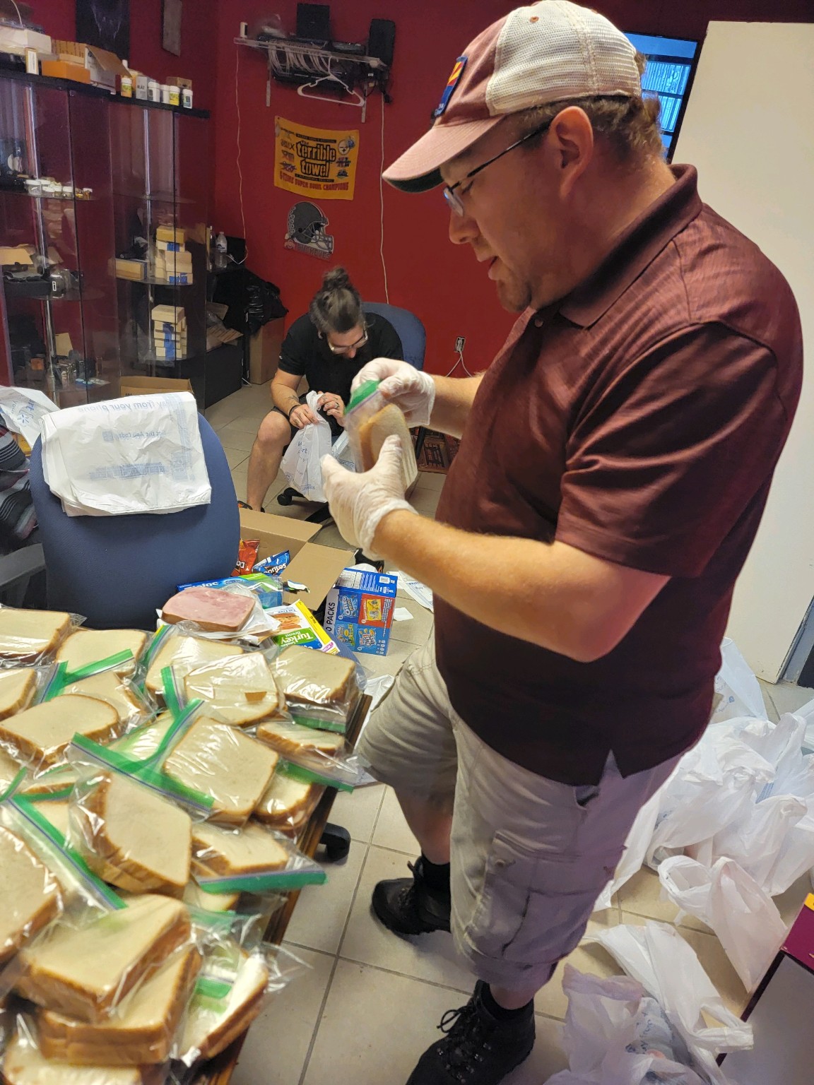 Bill helping prepare sandwiches—Terrence’s close friend and website collaborator.