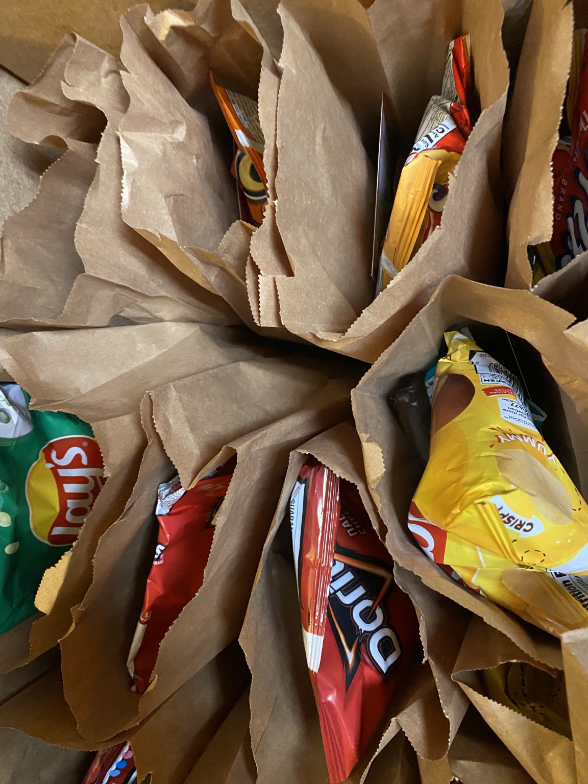 Food bags prepared for outreach distribution.