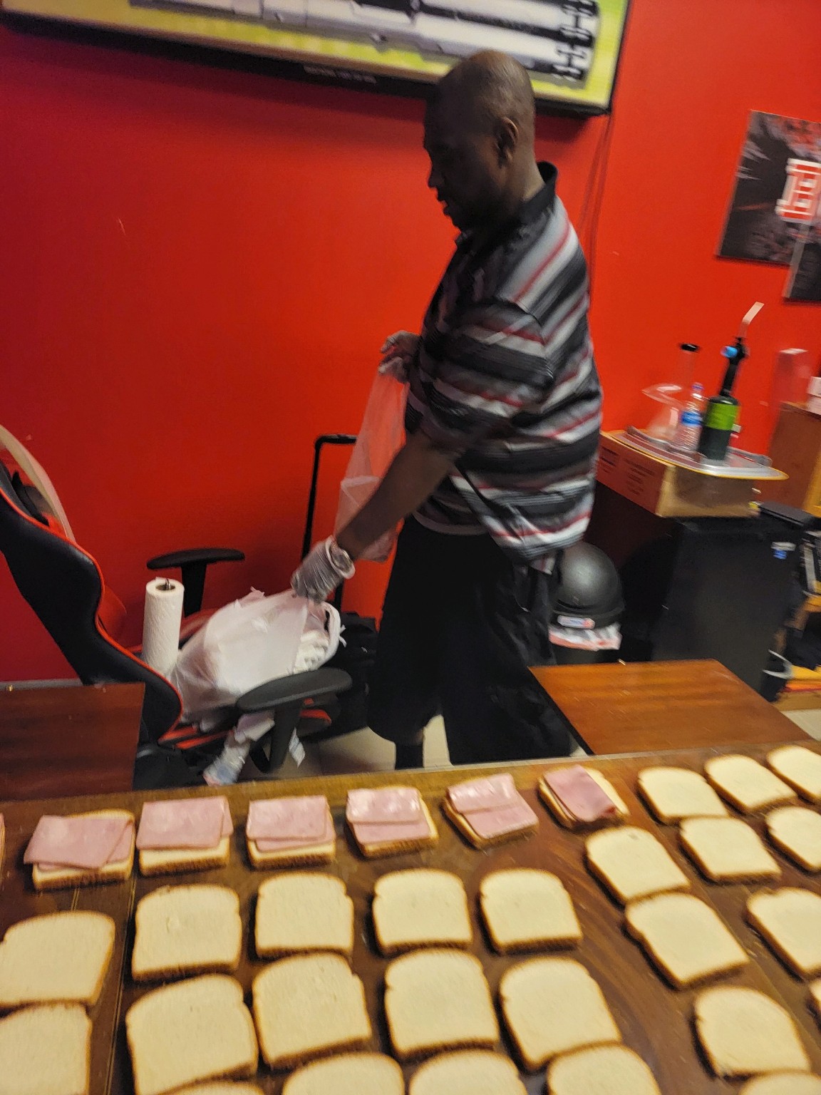 Terrence L Pounds preparing sandwiches for Truth Ministries outreach.